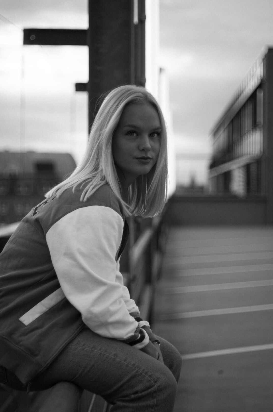 Portrait of a smiling blonde woman in a blazer