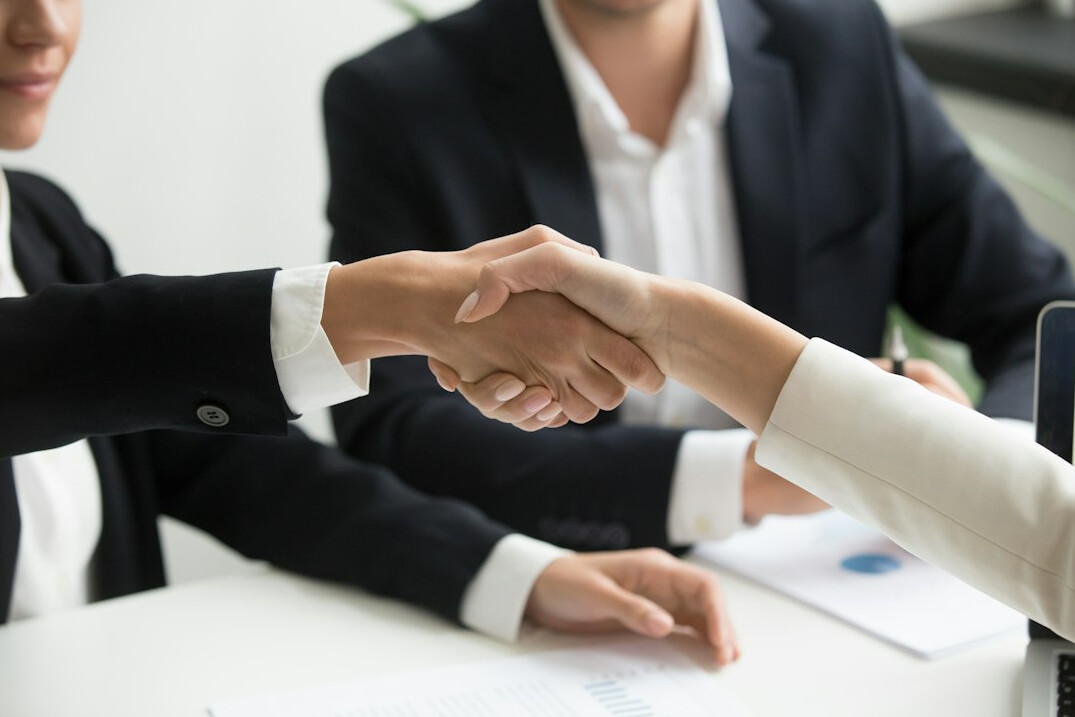 business people negotiating table