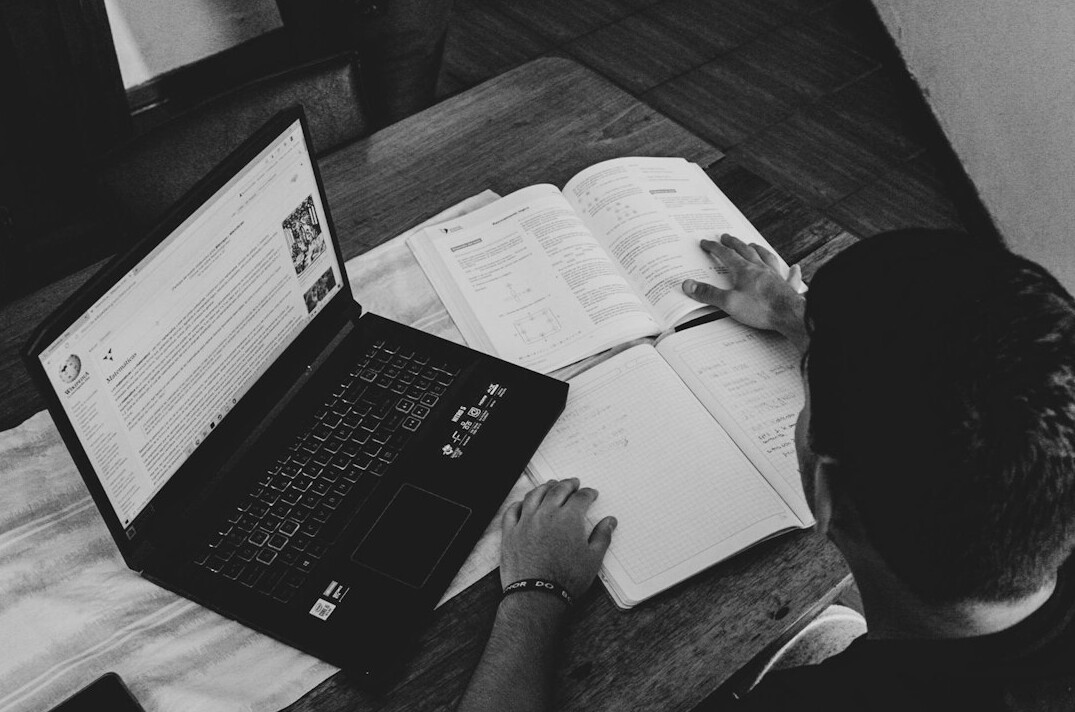 person studying negotiation book