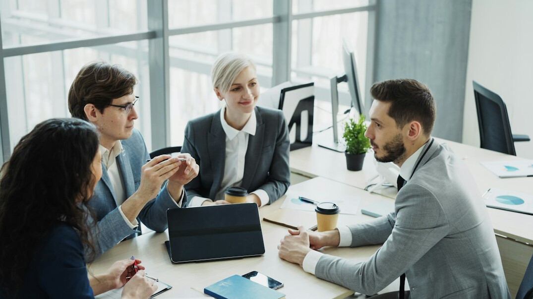 business professionals negotiating deal